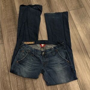 Low rise vintage Lucky Brans flare jeans with a dark wash